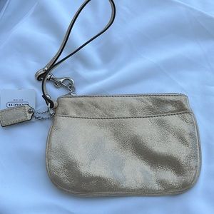 NWT Mini Champagne Gold Leather Coach Wristlet
NWT